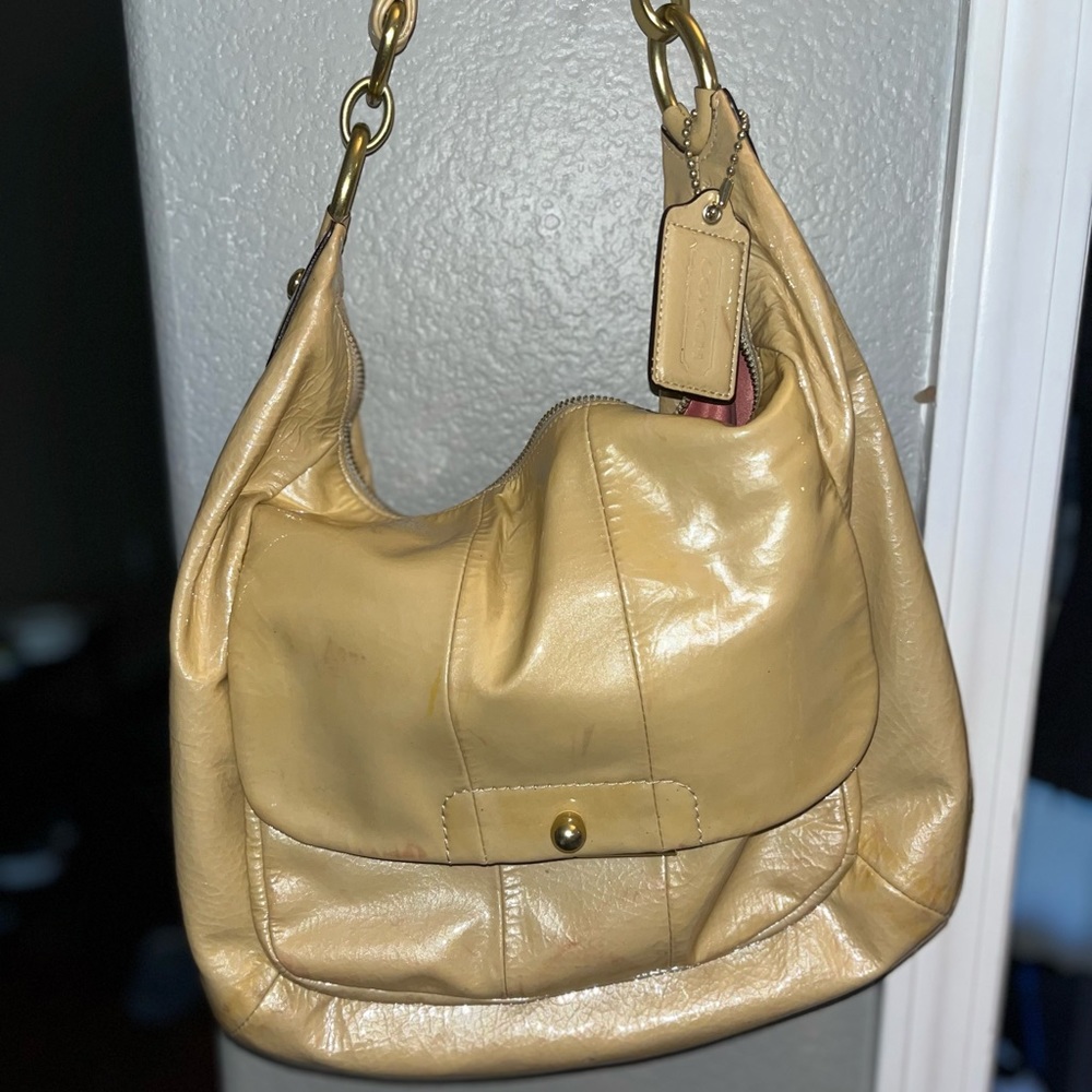 Tan Coach purse